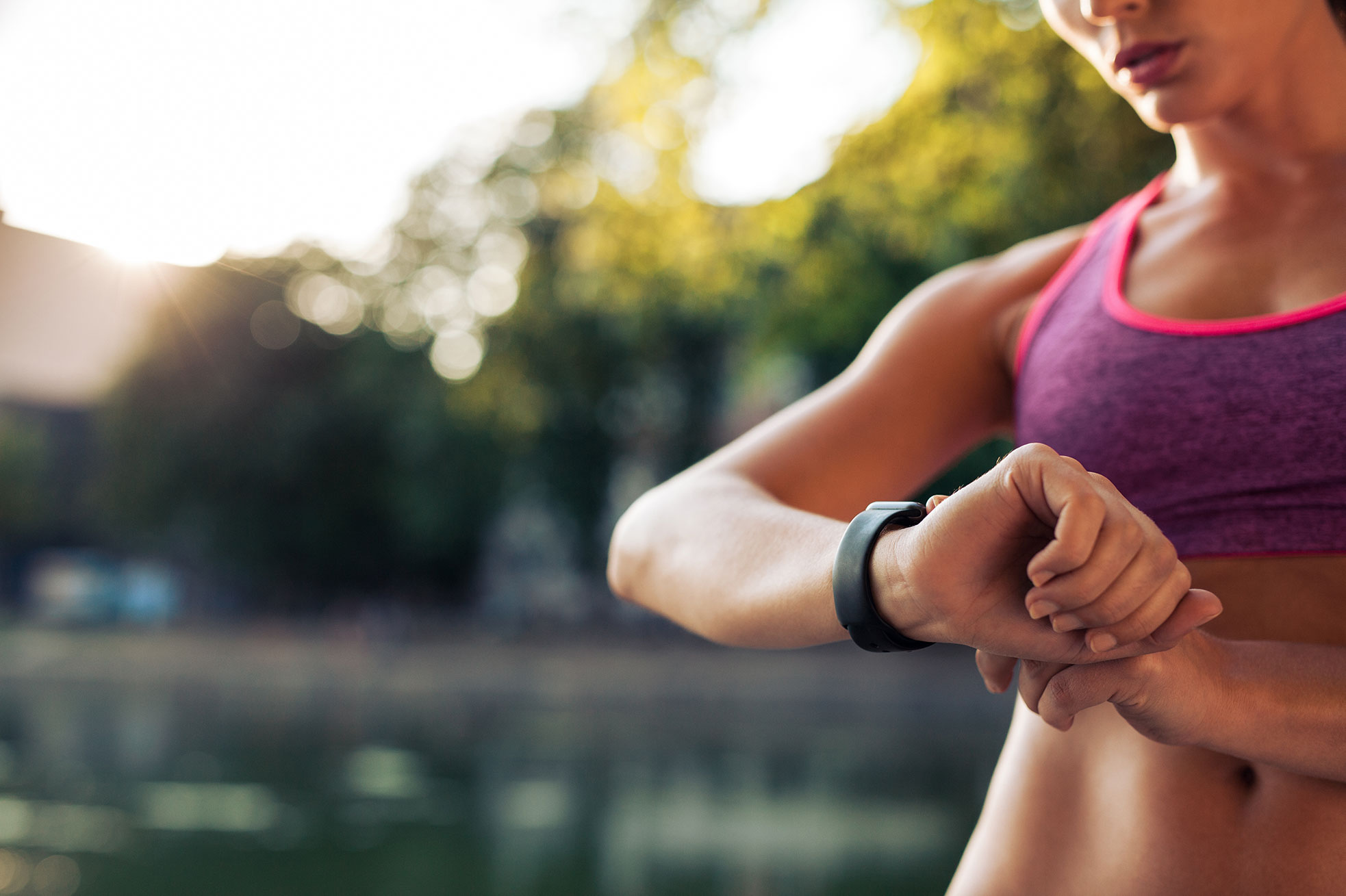 Outdoor runner checking watch